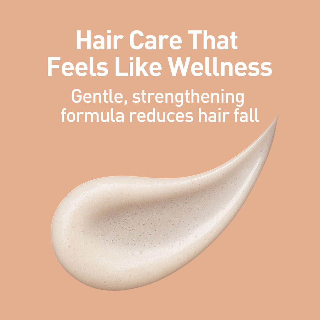 Hair care product with text on a peach background