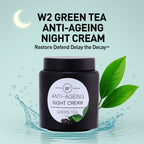 W2 Green Tea Anti-Ageing Night Cream jar with green leaves and water droplets on a light blue background