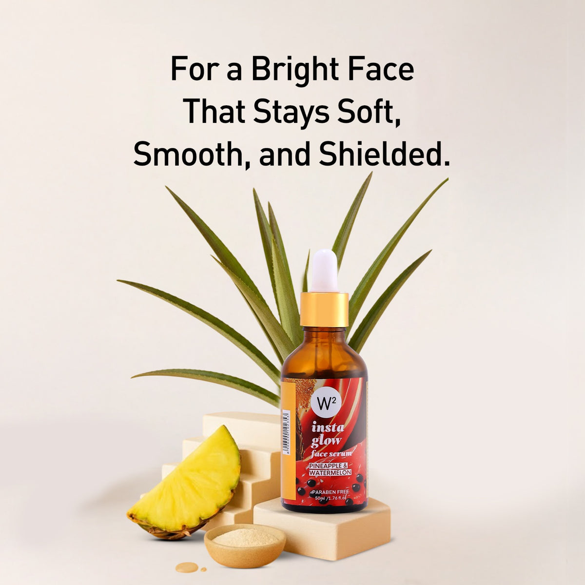Bottle of W2 skincare product with pineapple and soap on a light background