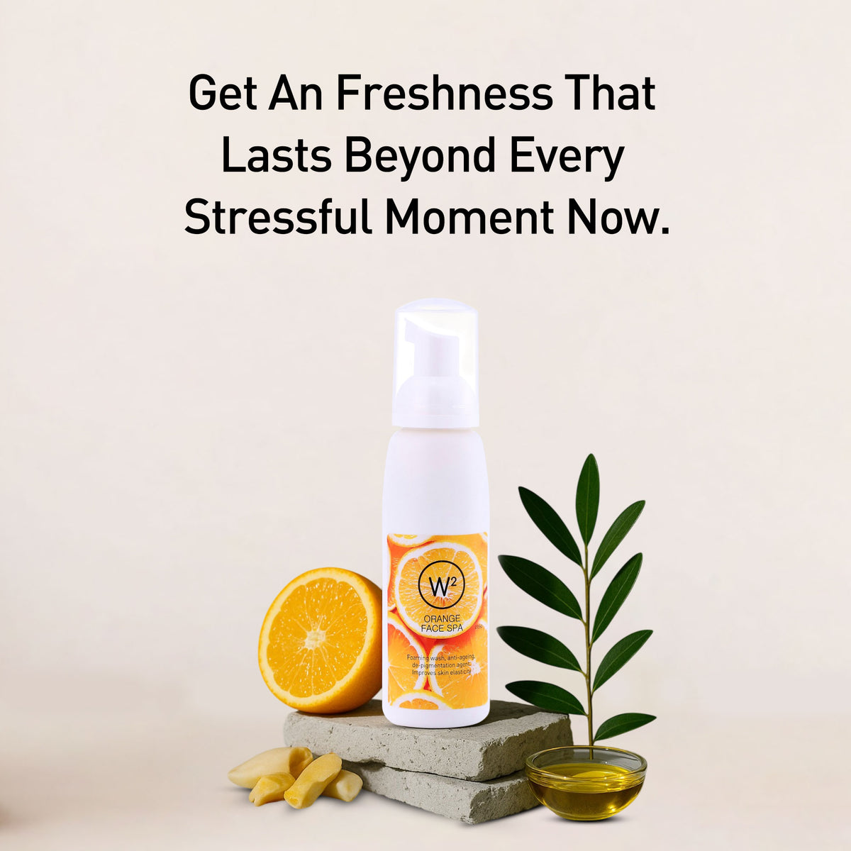 Product bottle with orange, leaves, and oil on a light background with text.