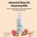 Almond & Rose Oil Cleansing Milk bottle with roses and almonds on a beige background