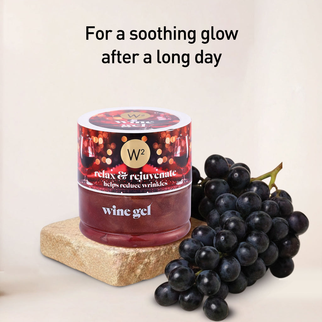 Wine gel jar with grapes and text 'For a soothing glow after a long day' on a light background