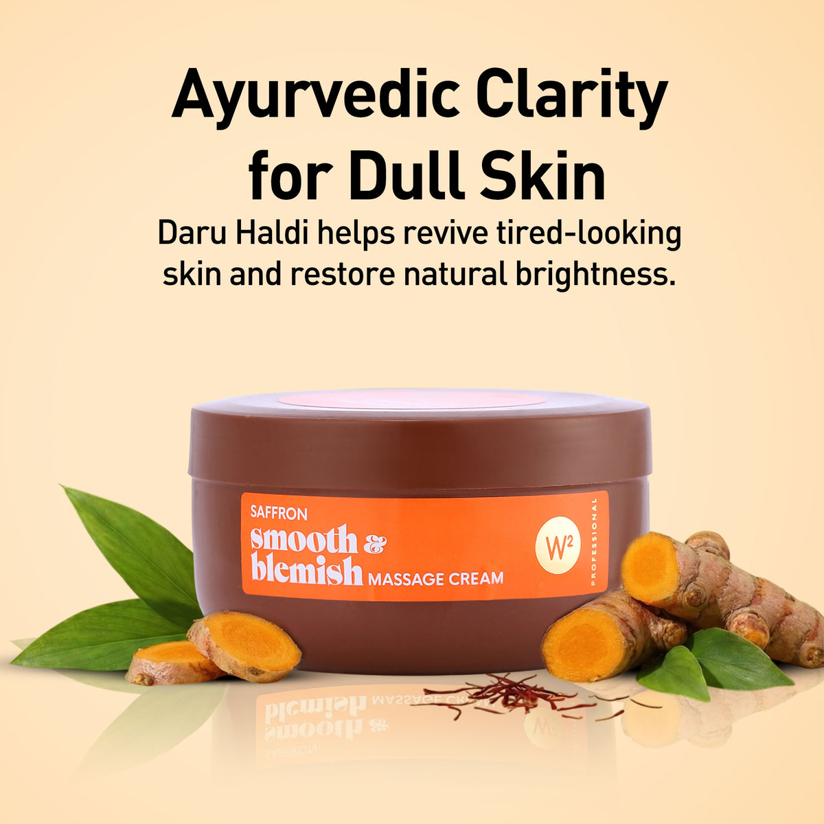 Jar of Saffron Smooth & Blemish Massage Cream with turmeric roots and leaves on a beige background