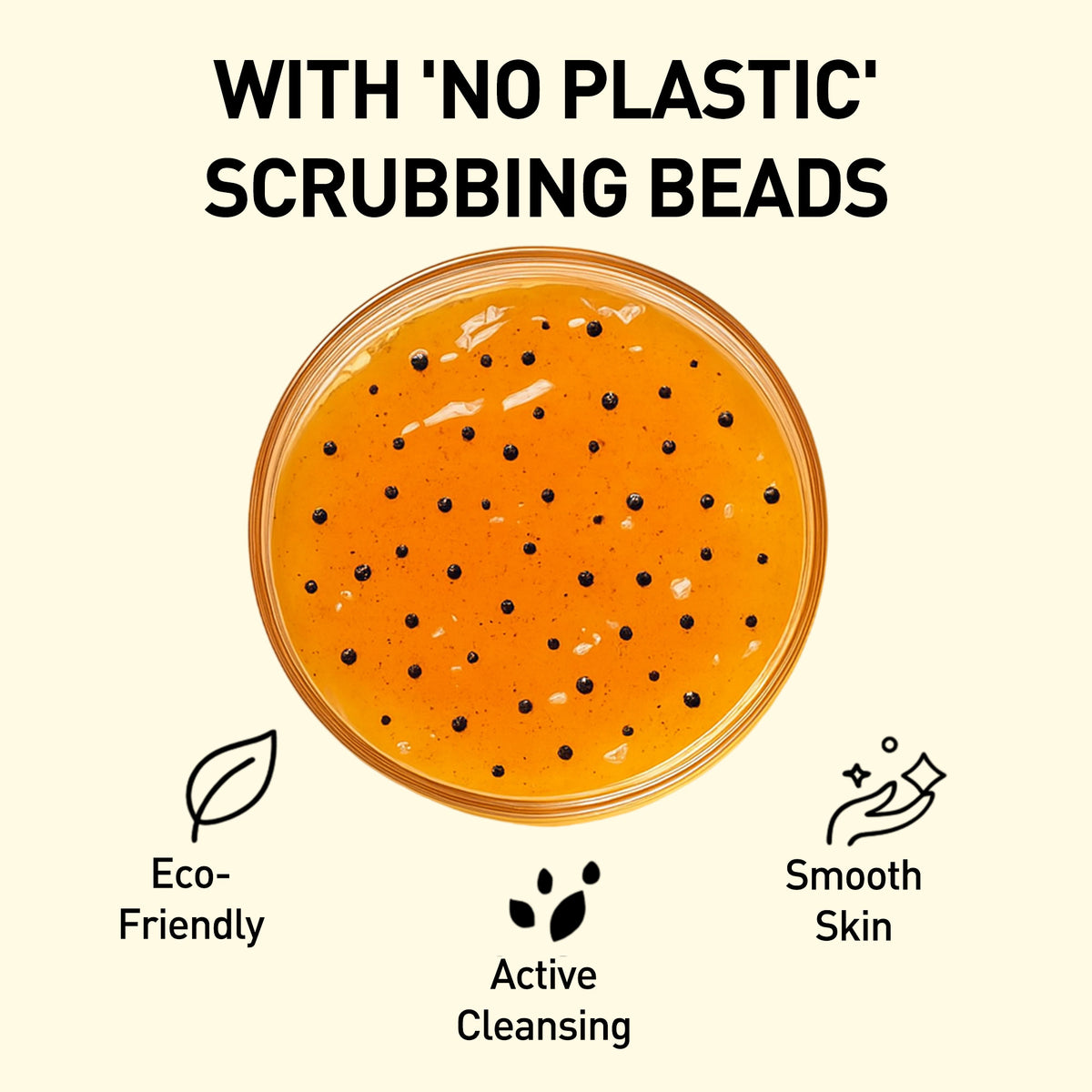 Orange scrub with black beads in a jar, labeled 'No Plastic Scrubbing Beads', on a beige background.