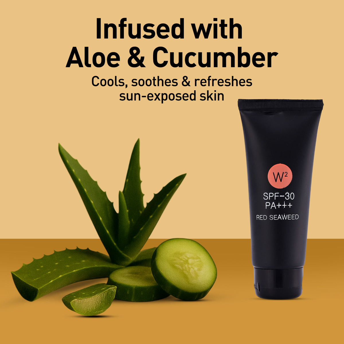 Black tube of sunscreen with aloe vera and cucumber on a beige background