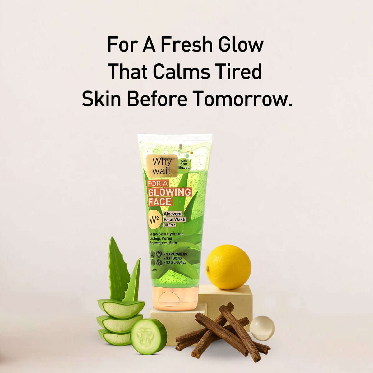 Facial wash product with aloe vera, lemon, and cucumber on a light background