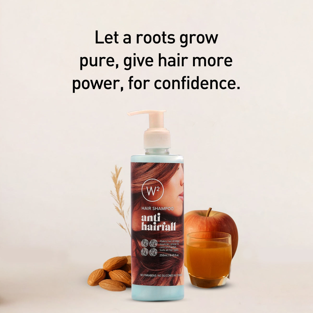 Shampoo bottle with text 'Let a roots grow pure, give hair more power, for confidence.' on a light background.